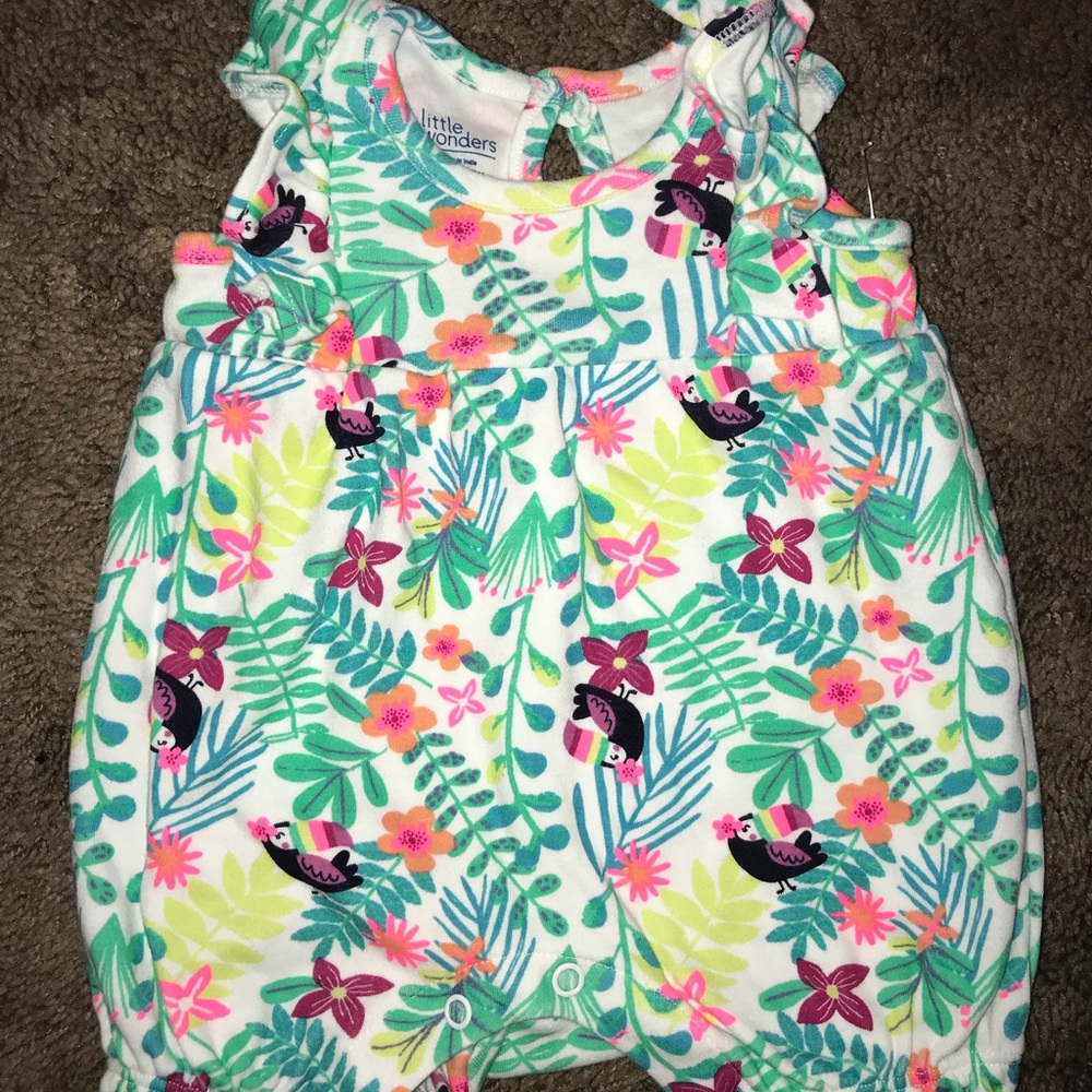 Newborn tropical toucan print romper.